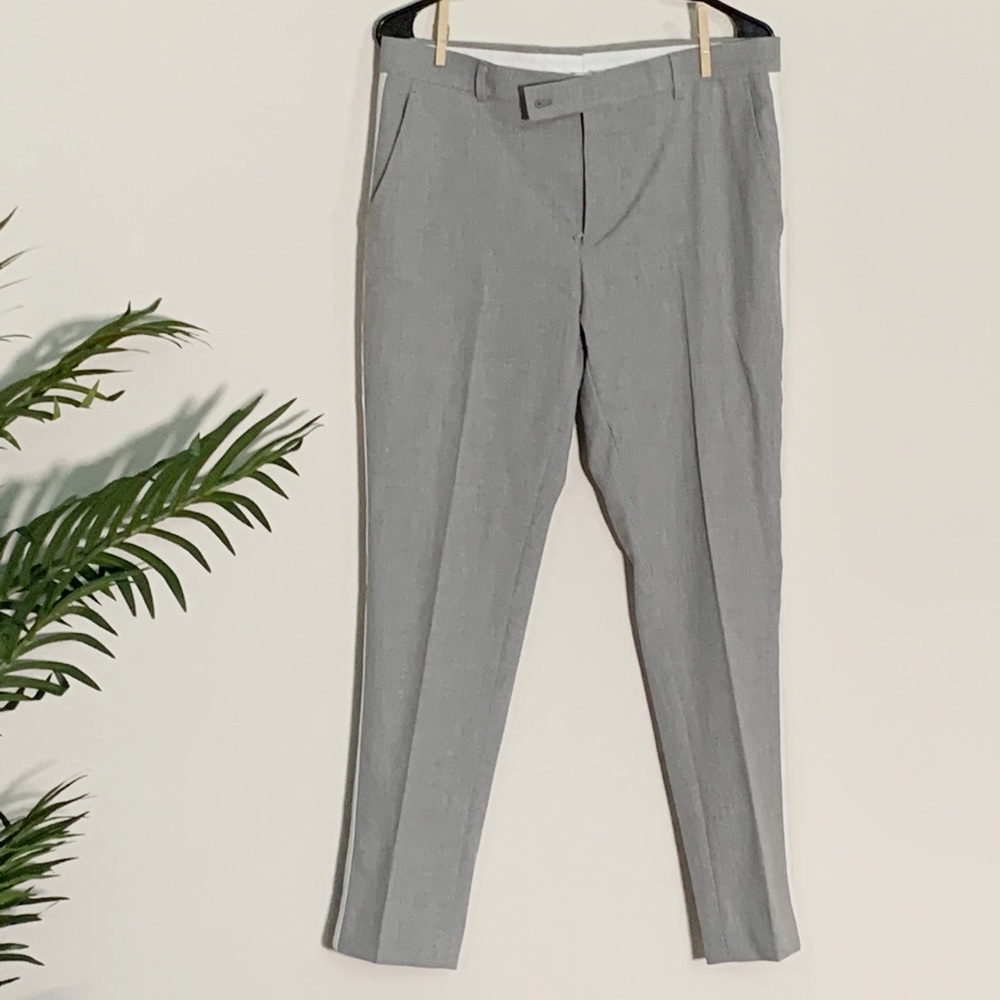 Dress pants with vertical white stripe